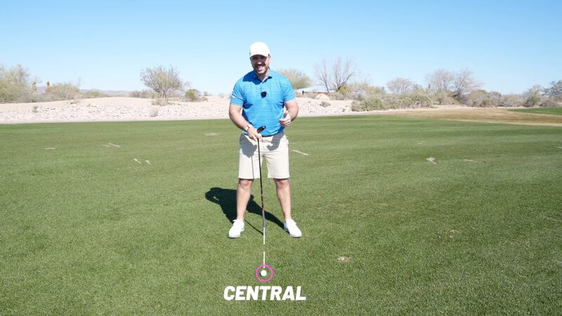 Man Demonstrating the Correct Ball Position in Golf